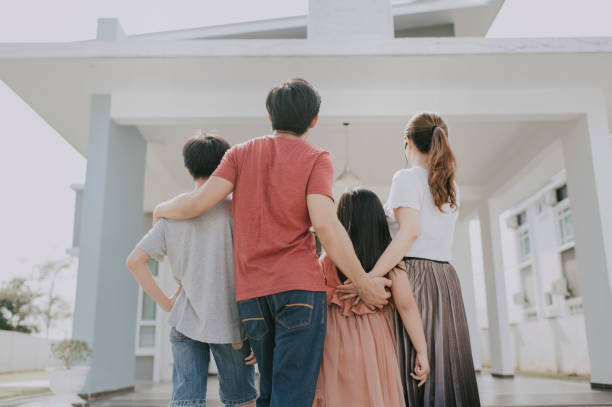 Family exploring their new House and Lot in San Fernando, Pampanga - Real Estate Happiness.